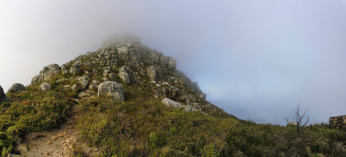 Chapman’s Peak summit, shrouded by a veil of clouds