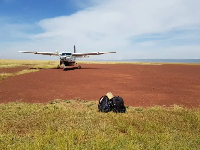 Bags and small aircraft in the Masai Mara