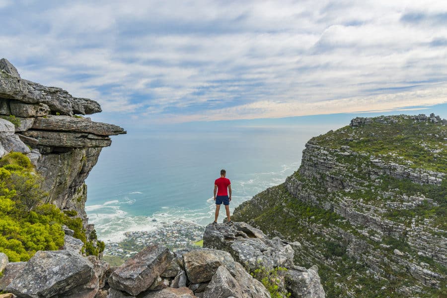 Man on top of Table Mountain, probably feeling like he's on top of the world