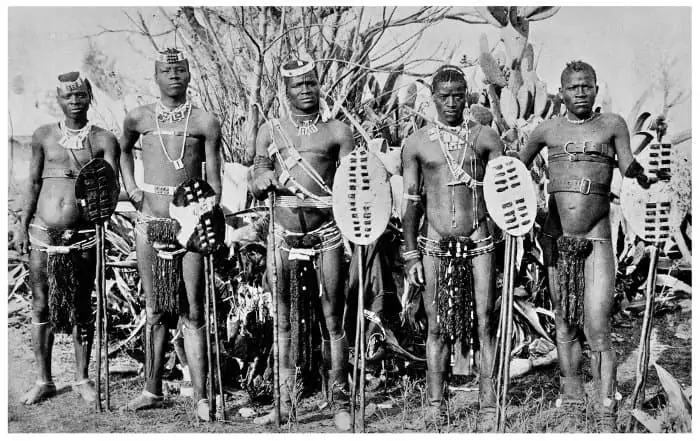 Five Zulu warriors posing for the shot, 1925