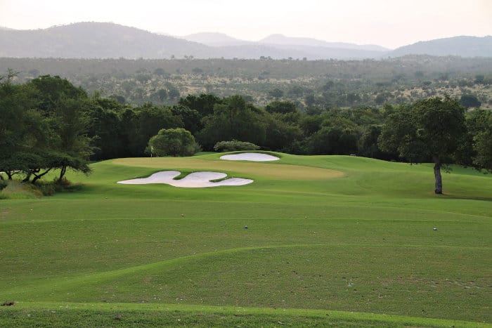 View of a fairway and green at the Leopard Creek Country Club