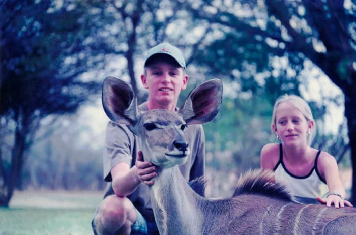 My sister and I posing with a female kudu in Zambia